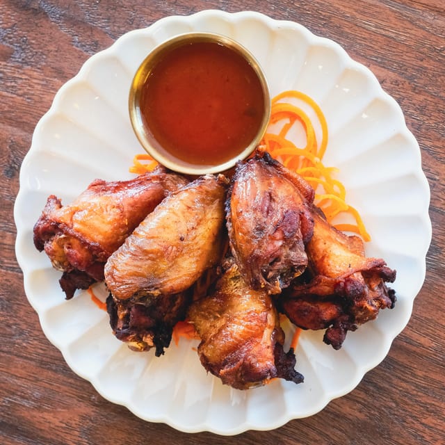 Thai Wings.